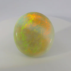 Vibrant Opal Gemstone in Hand