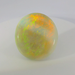 Vibrant Opal Gemstone in Hand