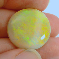 Vibrant Opal Gemstone in Hand