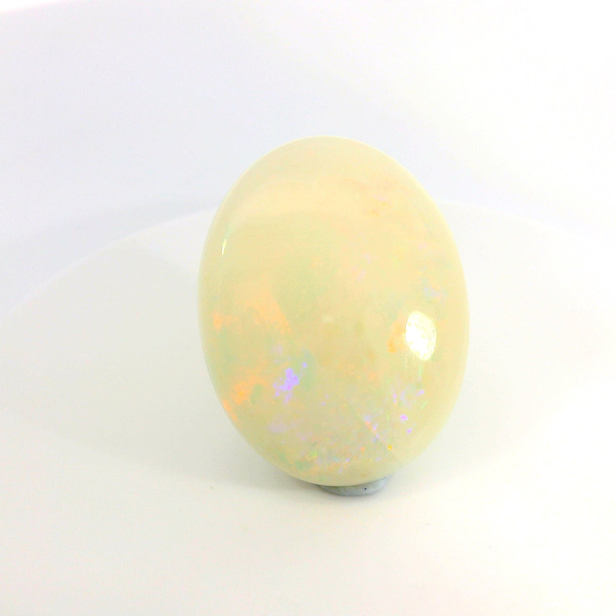 Captivating Opal Gemstone in Hand
