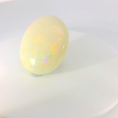 Captivating Opal Gemstone in Hand