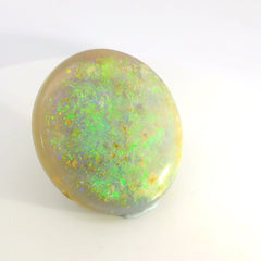 Vibrant Opal Gemstone in Hand
