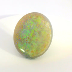 Vibrant Opal Gemstone in Hand