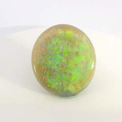 Vibrant Opal Gemstone in Hand