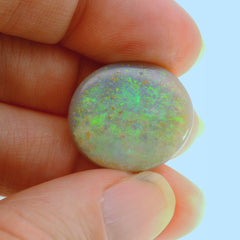 Vibrant Opal Gemstone in Hand