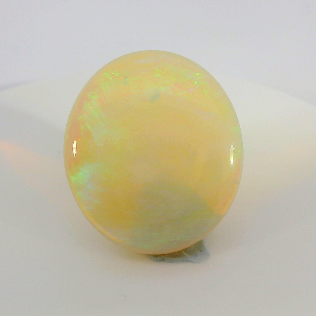 Vibrant Opal Gemstone in Hand