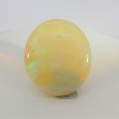 Vibrant Opal Gemstone in Hand