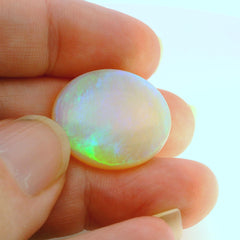 Vibrant Opal Gemstone in Hand