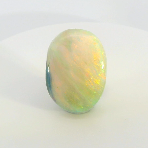 Vibrant Opal Gemstone in Hand