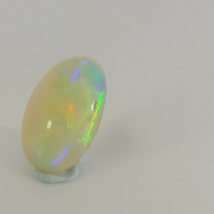 Vibrant Opal Gemstone in Hand
