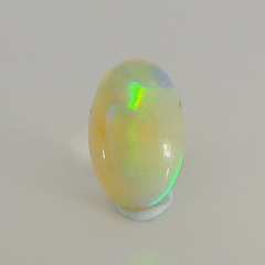Vibrant Opal Gemstone in Hand