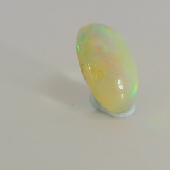Vibrant Opal Gemstone in Hand