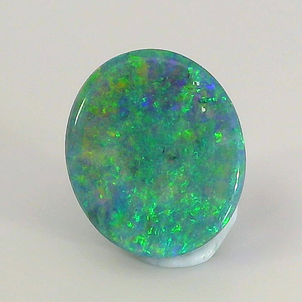 Vibrant Opal Gemstone in Hand