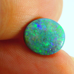 Vibrant Opal Gemstone in Hand
