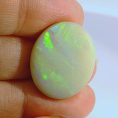Vibrant Opal Gemstone in Hand