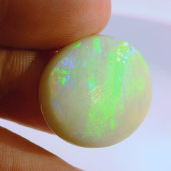 Vibrant Opal Gemstone in Hand