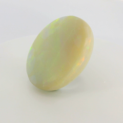 Vibrant Opal Gemstone in Hand