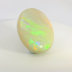 Vibrant Opal Gemstone in Hand