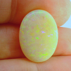 Vibrant Opal Gemstone in Hand