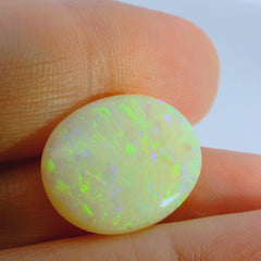 Vibrant Opal Gemstone in Hand