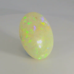 Vibrant Opal Gemstone in Hand