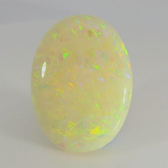 Vibrant Opal Gemstone in Hand