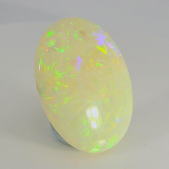 Vibrant Opal Gemstone in Hand