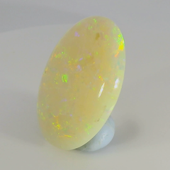 Vibrant Opal Gemstone in Hand