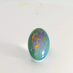 Vibrant Opal Gemstone in Hand