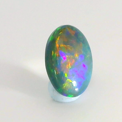 Vibrant Opal Gemstone in Hand