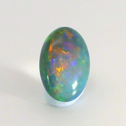 Vibrant Opal Gemstone in Hand