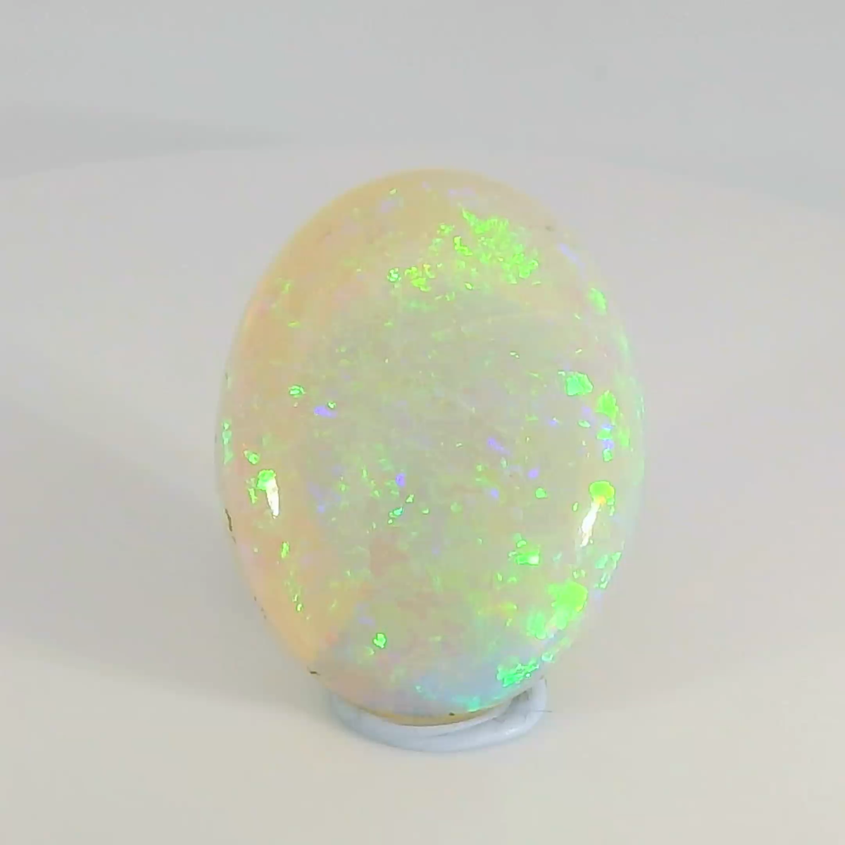 Captivating Opal Gemstone in Hand