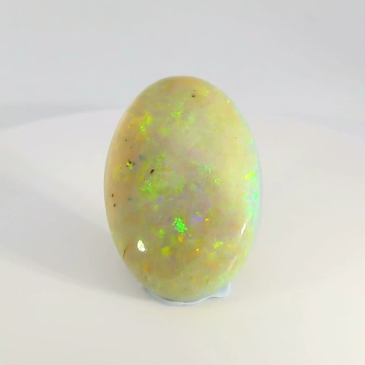 Vibrant Opal Gemstone in Hand