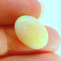 Vibrant Opal Gemstone in Hand