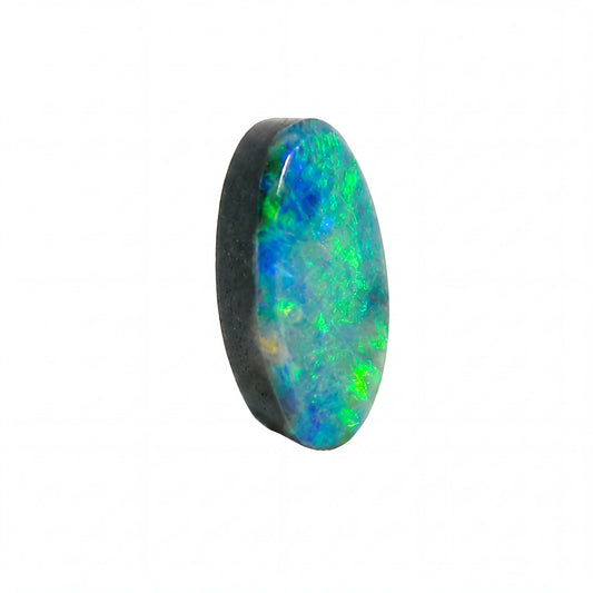 A single oval cabochon opal gemstone showing vibrant blue, green, and orange flashes, set against a solid white background.