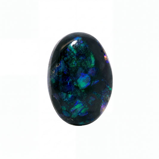 A polished oval cabochon gemstone featuring a dark base with vibrant flashes of blue, green, and purple iridescence, set against a plain white background.