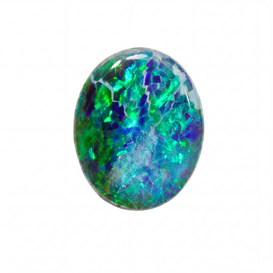 A polished oval cabochon gemstone featuring a vibrant play-of-colour pattern with green, blue, purple, and white hues, isolated on a solid white background.