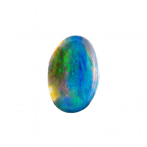 A polished oval cabochon gemstone showing vibrant iridescent colours including blue, green, and hints of yellow and purple, isolated on a solid white background.