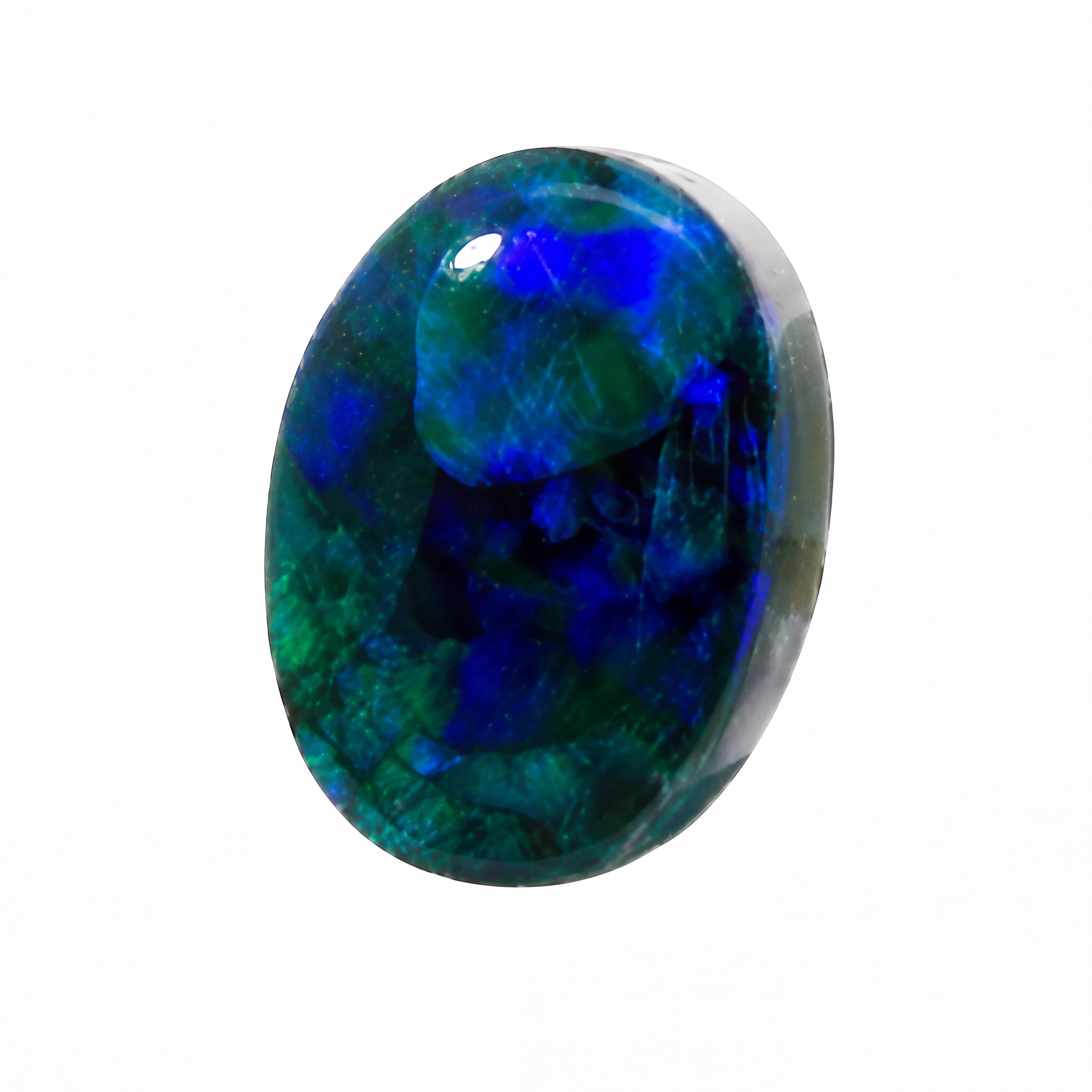 A polished oval cabochon gemstone featuring vibrant blue and green iridescent opal patterns, set against a solid white background.