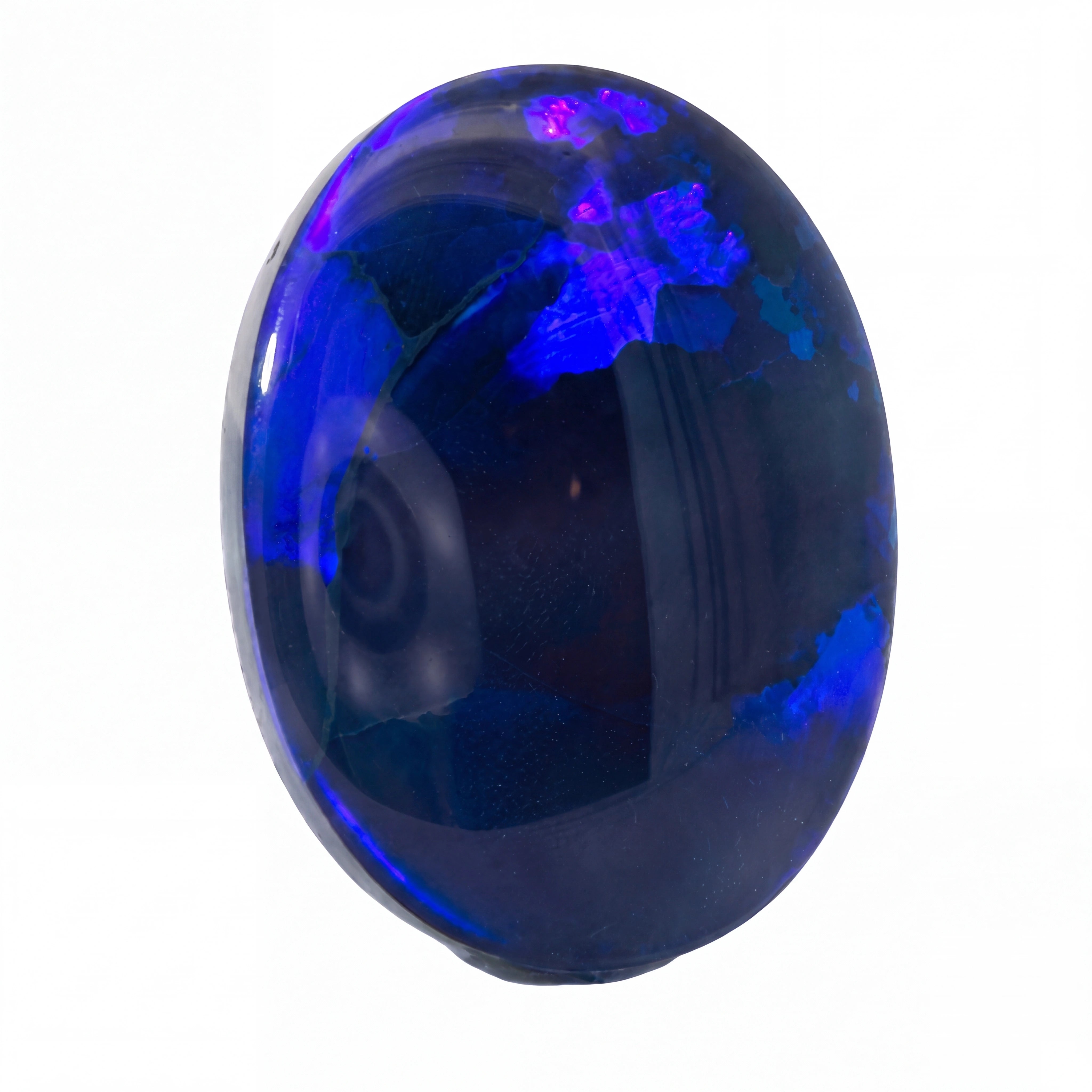 A polished oval cabochon gemstone with a deep blue body and vibrant purple-blue iridescent inclusions, shown on a plain white background.