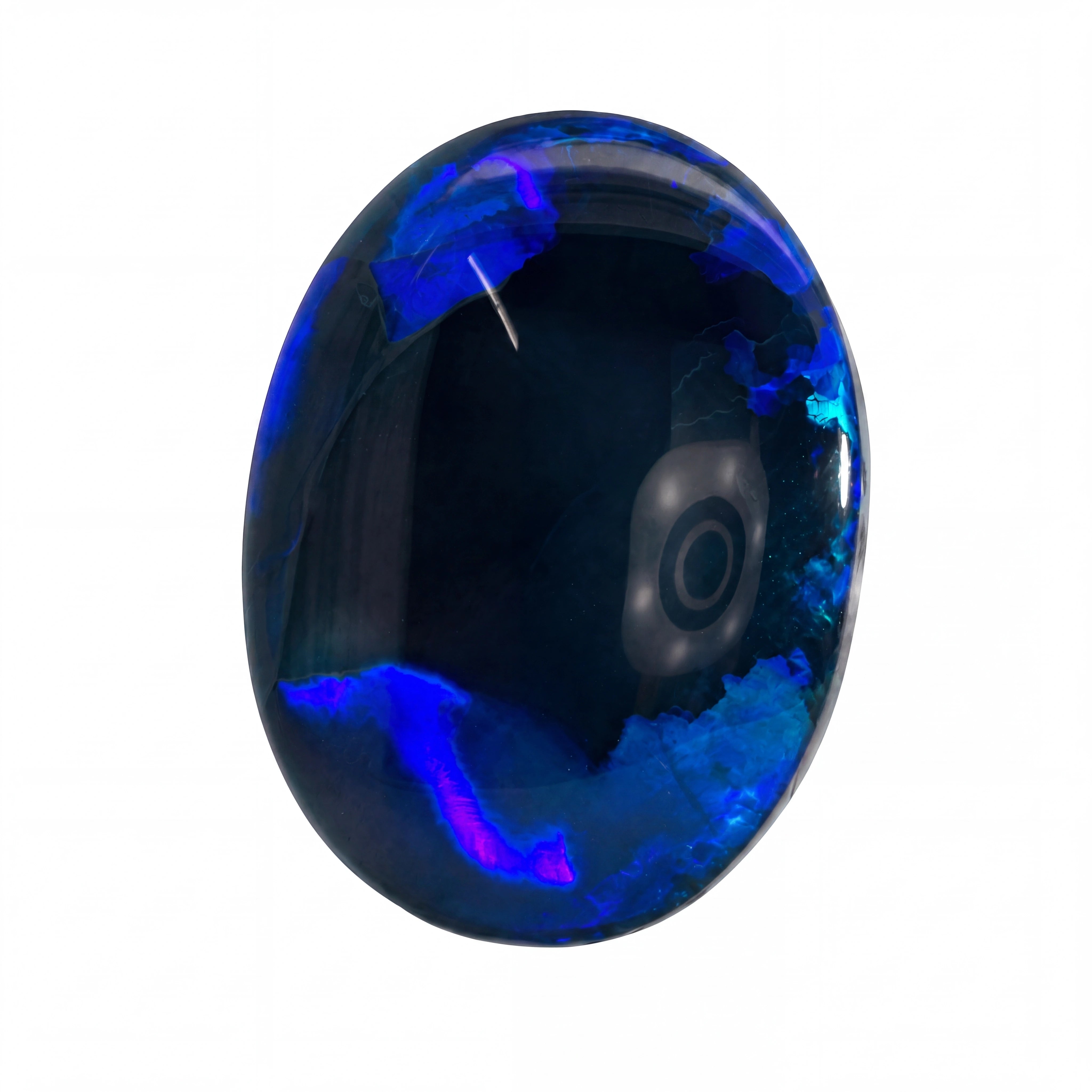 A polished oval cabochon gemstone featuring a deep black base with vibrant blue and purple iridescent opal-like inclusions, shown on a plain white background.