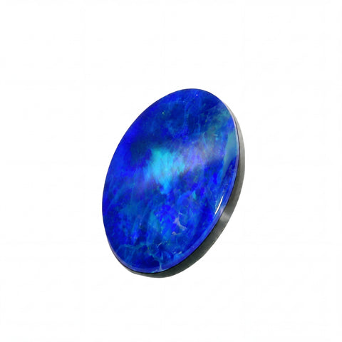 A polished oval cabochon gemstone with vibrant blue and lighter turquoise iridescent areas, set in a dark bezel on a plain white background.