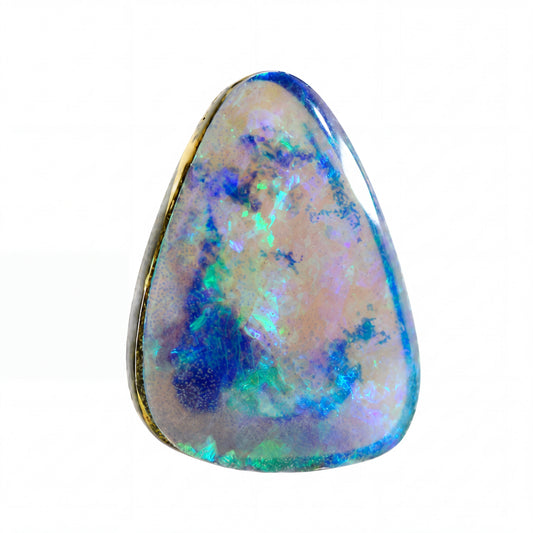 A teardrop-shaped guitar pick with a marbled pattern of deep blue, teal, and green, shown on a plain white background.