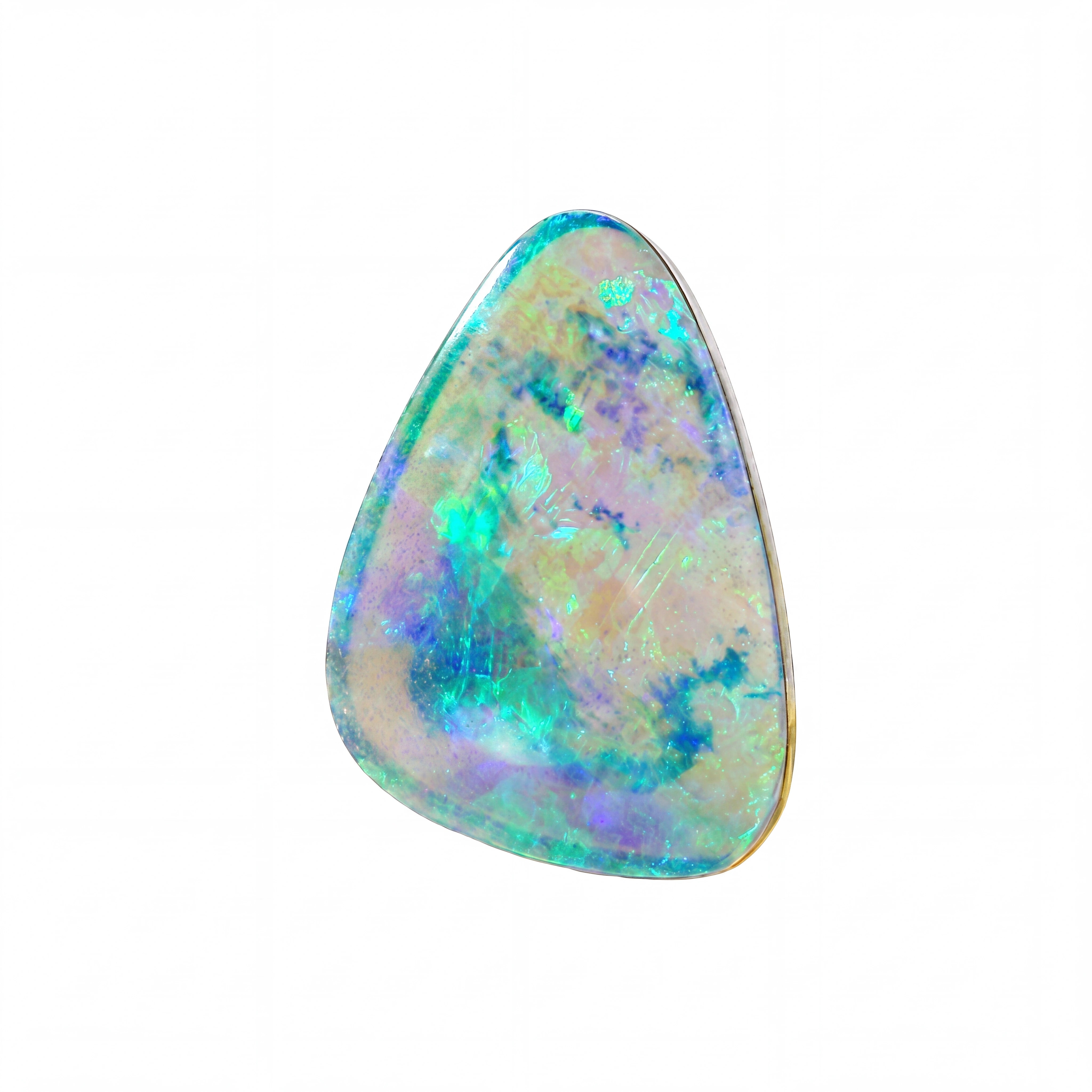 A triangular cabochon gemstone with vibrant iridescent opalisation showing flashes of blue, green, purple, and cream on a white background.