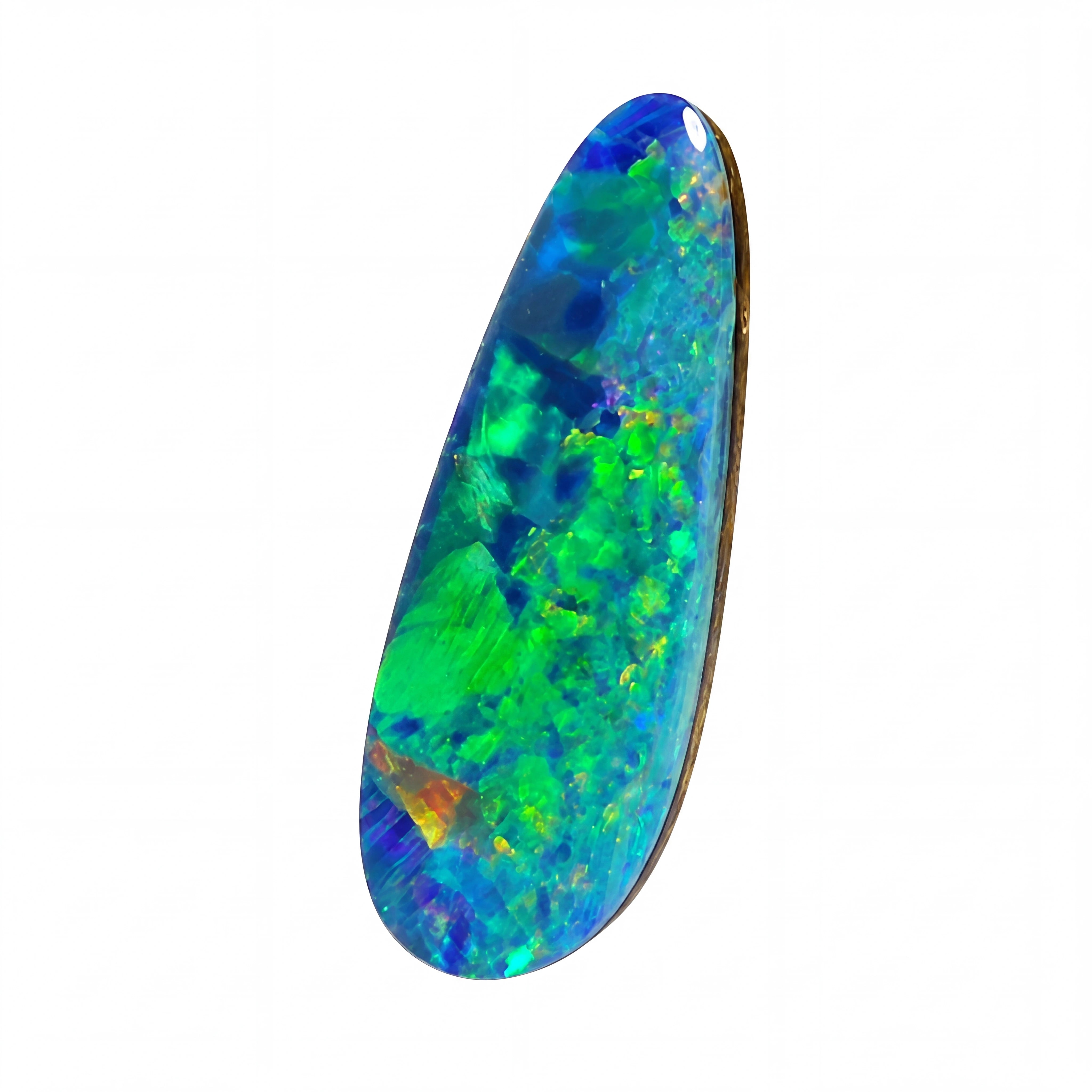 A teardrop-shaped cabochon opal gemstone displaying vibrant iridescent colours of green, blue, and orange, set in a gold bezel on a plain white background.