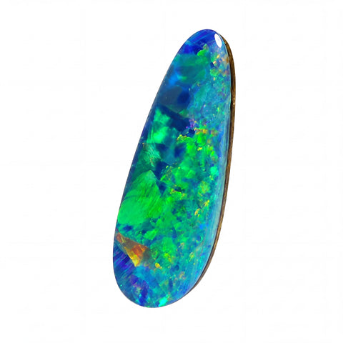 A teardrop-shaped cabochon opal gemstone displaying vibrant iridescent colours of green, blue, and orange, set in a gold bezel on a plain white background.