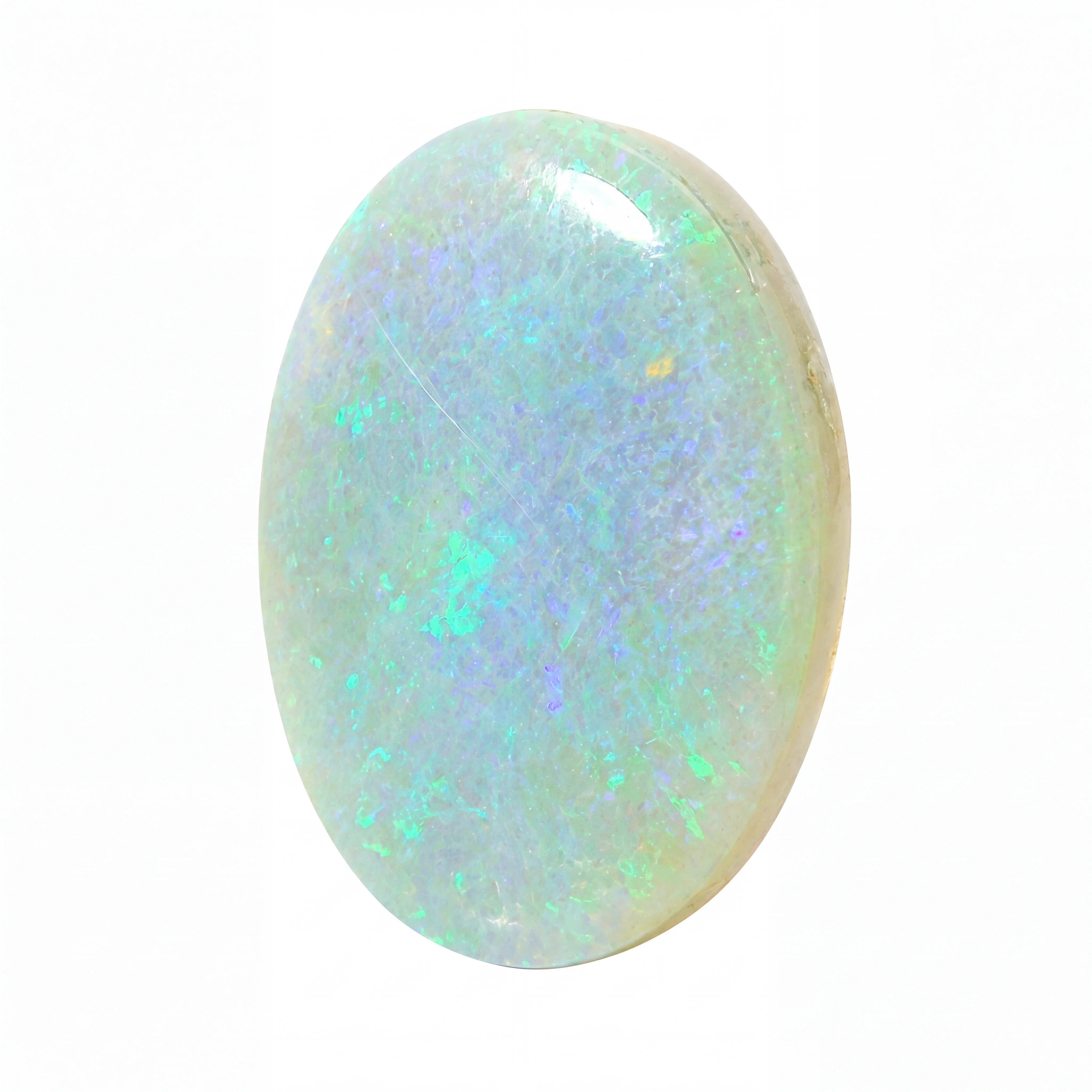 An oval cabochon opal gemstone displaying a play-of-colour with iridescent flashes of green, blue, and purple on a white base, set against a plain white background.