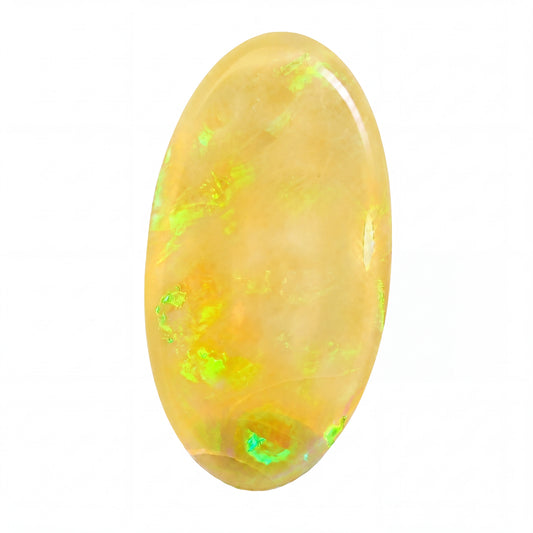 A polished oval cabochon gemstone with a warm golden-yellow body and vibrant green flashes, shown on a solid white background.