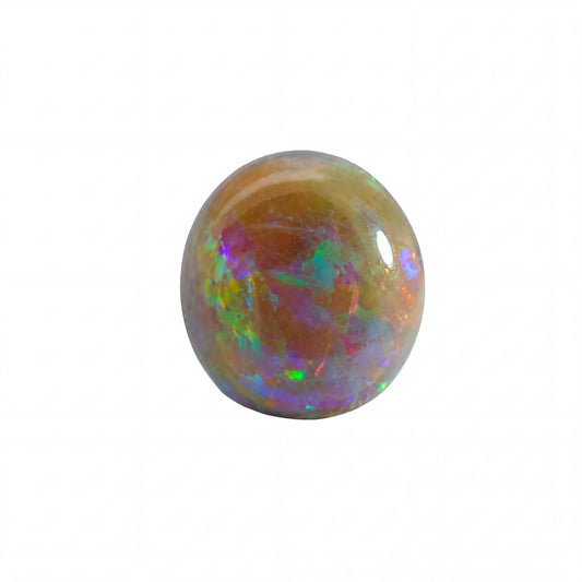 A polished round cabochon opal gemstone displaying a spectrum of iridescent colours including green, purple, orange, and blue over a warm brownish-gold base, isolated on a white background.