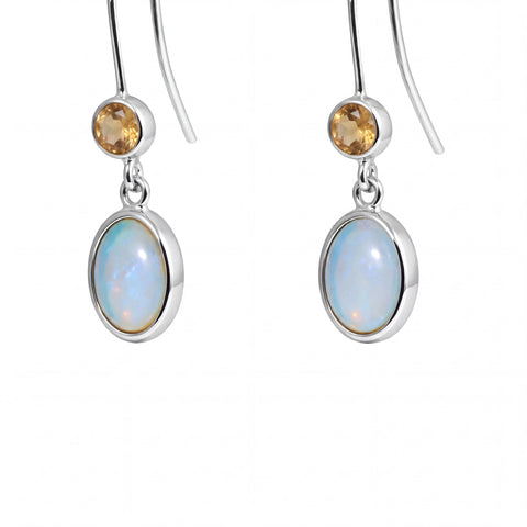 Silver earrings with opal stones and citrine accents on a white background